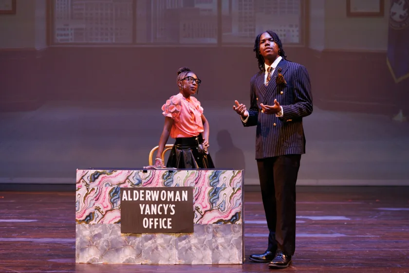 FieldCrest young actors performing a scene in costume on stage